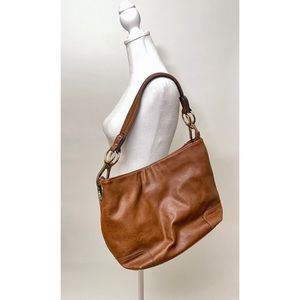 Charming Charlie Tan Purse. Black and white stripe interior, clean